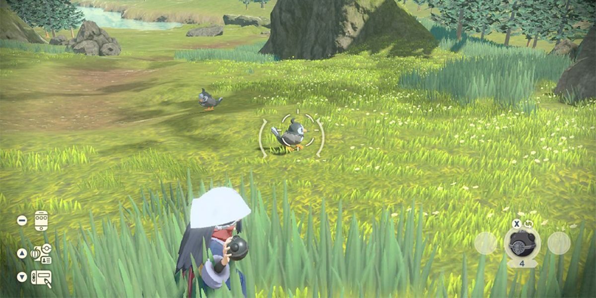pokemon-legends-arceus-a-player-gets-ready-to-throw-a-ball-at-a-starley-6397153